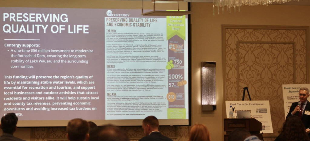 Dan Persica, public affairs, speaks to attendees about the importance the Rothschild Dam plays in preserving the quality of life and economic stability of central Wisconsin.