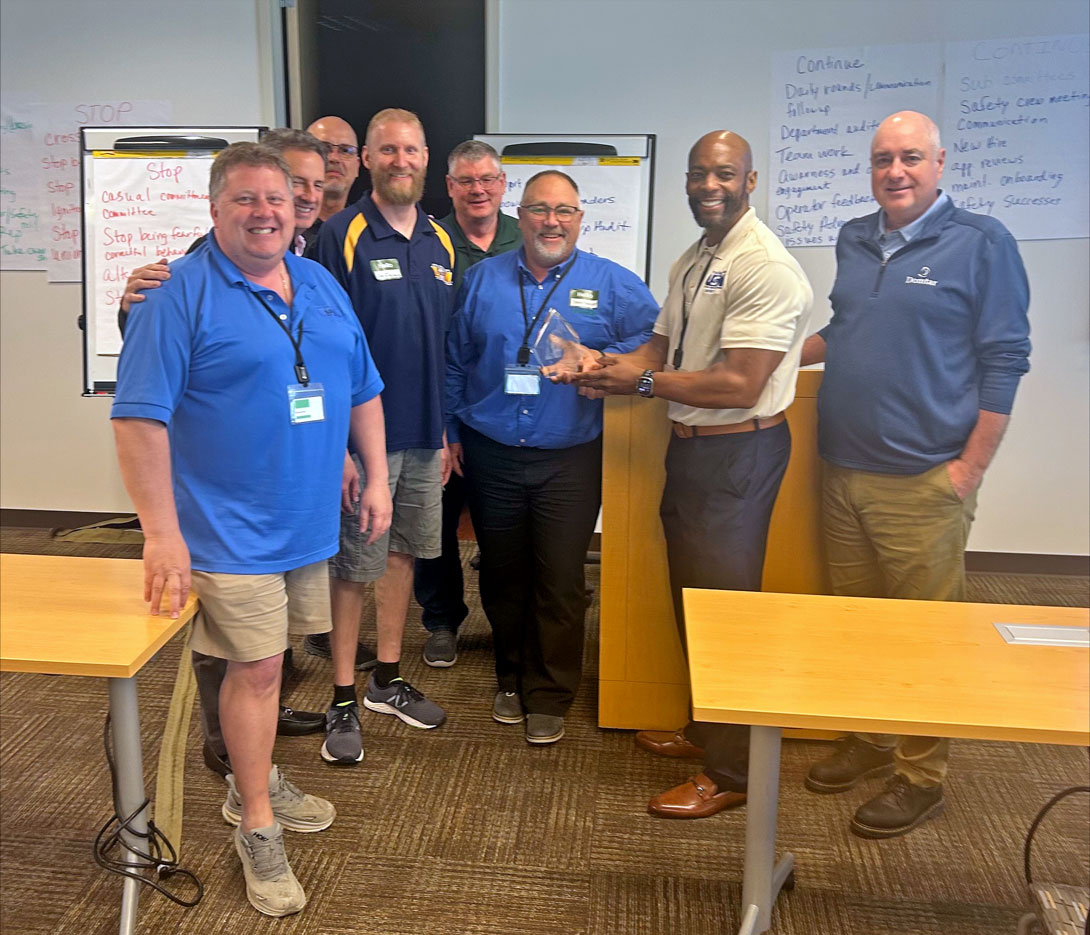 Domtar Rothschild Mill safety team posing with the Velma Perkins Safety Award during the 2025 Domtar/USW Safety Meeting.
