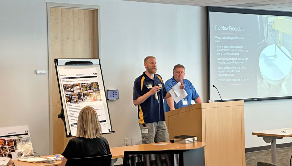 Domtar Rothschild employees presenting the hydraulic core remover safety innovation during the 2025 Domtar/USW Safety Meeting.