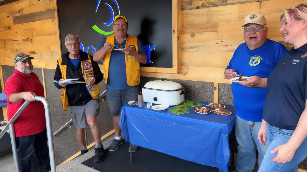 Scott Noble and Amanda Bowman prepared the Nekoosa Mill’s competition roast for judging.