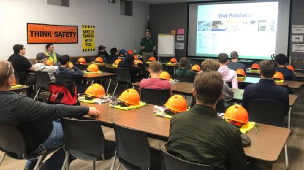 Students from Wausau West High School learn how forest fibers are made into essential projects during a tour of Domtar’s Rothschild Mill.