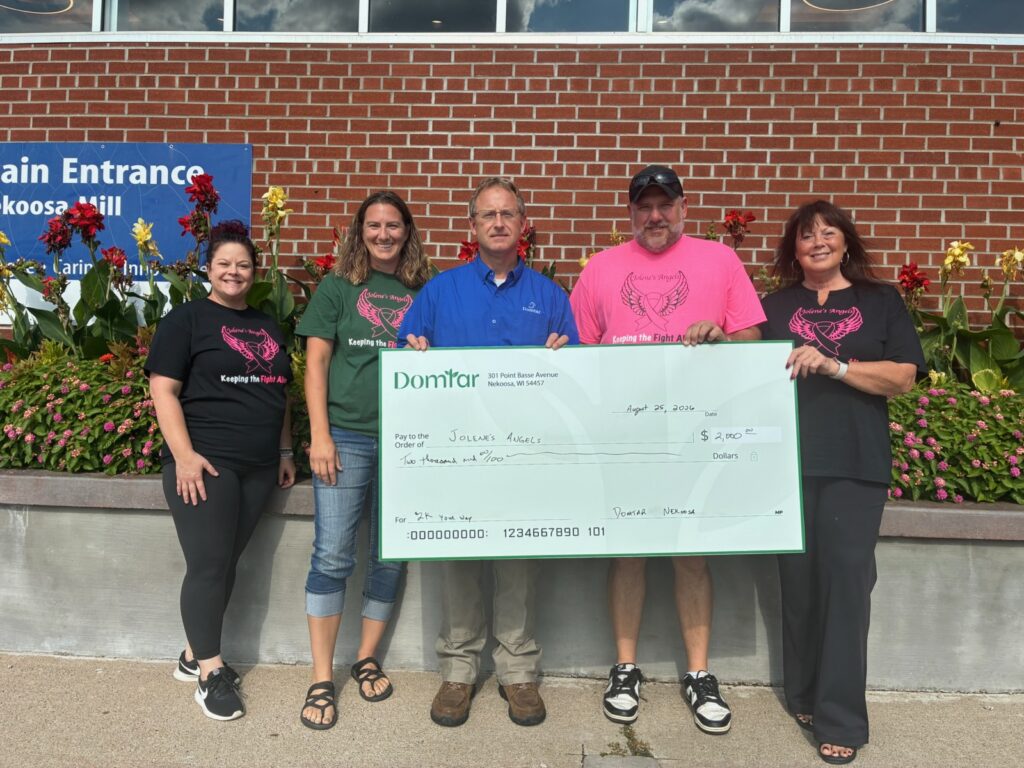 Domtar Nekoosa Mill Superintendent (Pulp & Power & Recovery) Bob Spring presents a $2,000 check to representatives from Jolene's Angels.