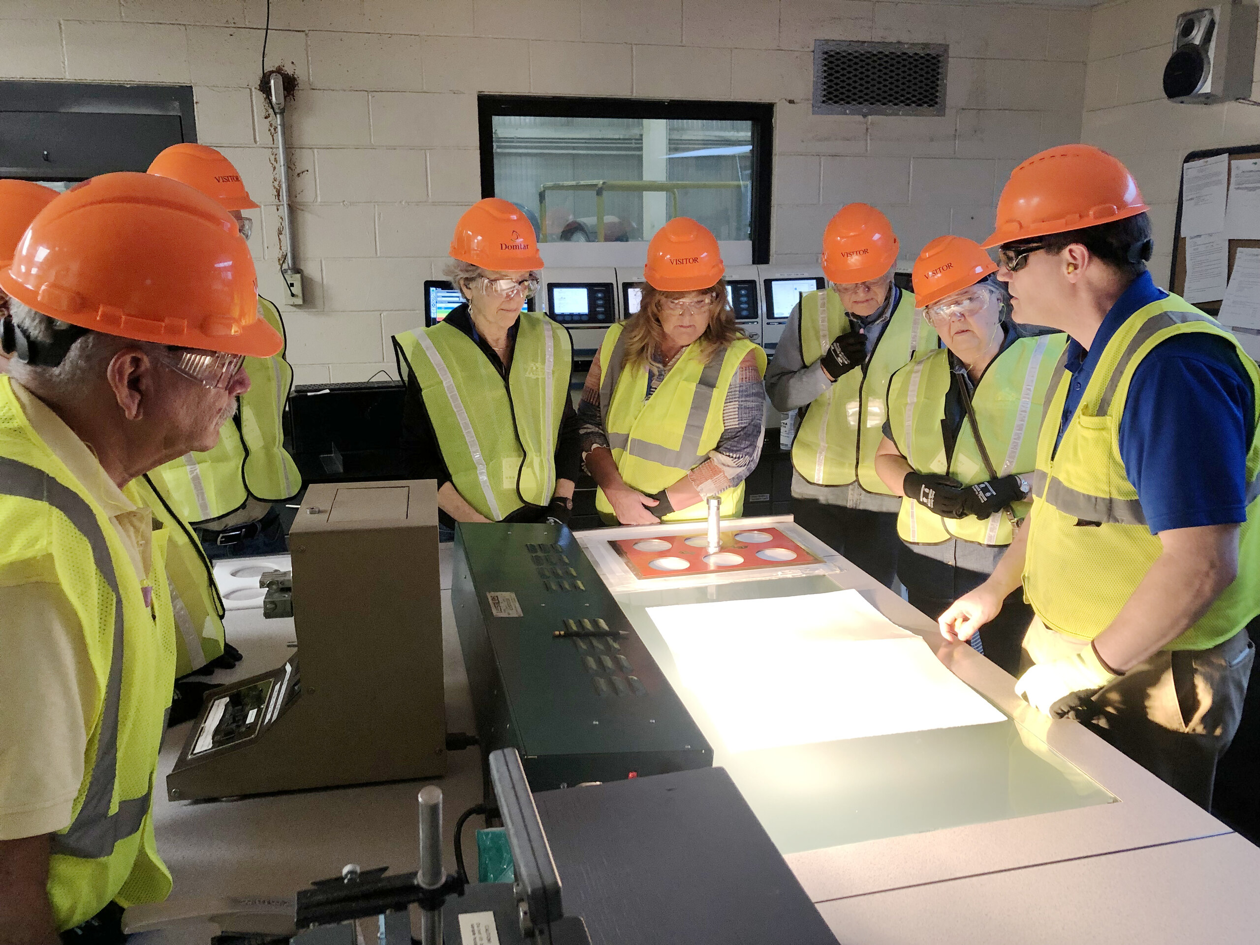 Wisconsin Woodland Owners Association members get a firsthand look at the papermaking process from Rothschild Mill employees.