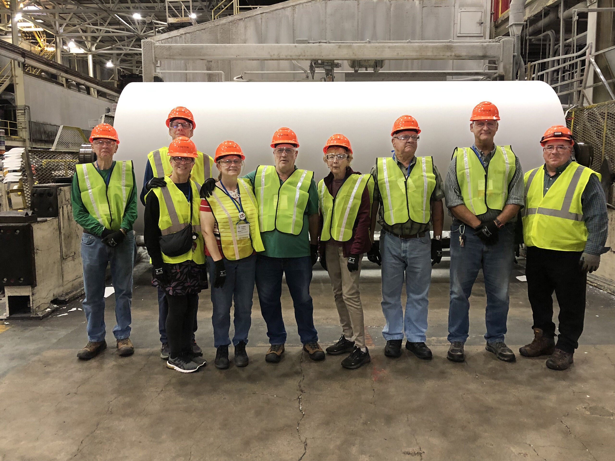 Association members discussed how sustainable forestry factors into Domtar's paper products, like this ream of paper inside the Rothschild Mill.